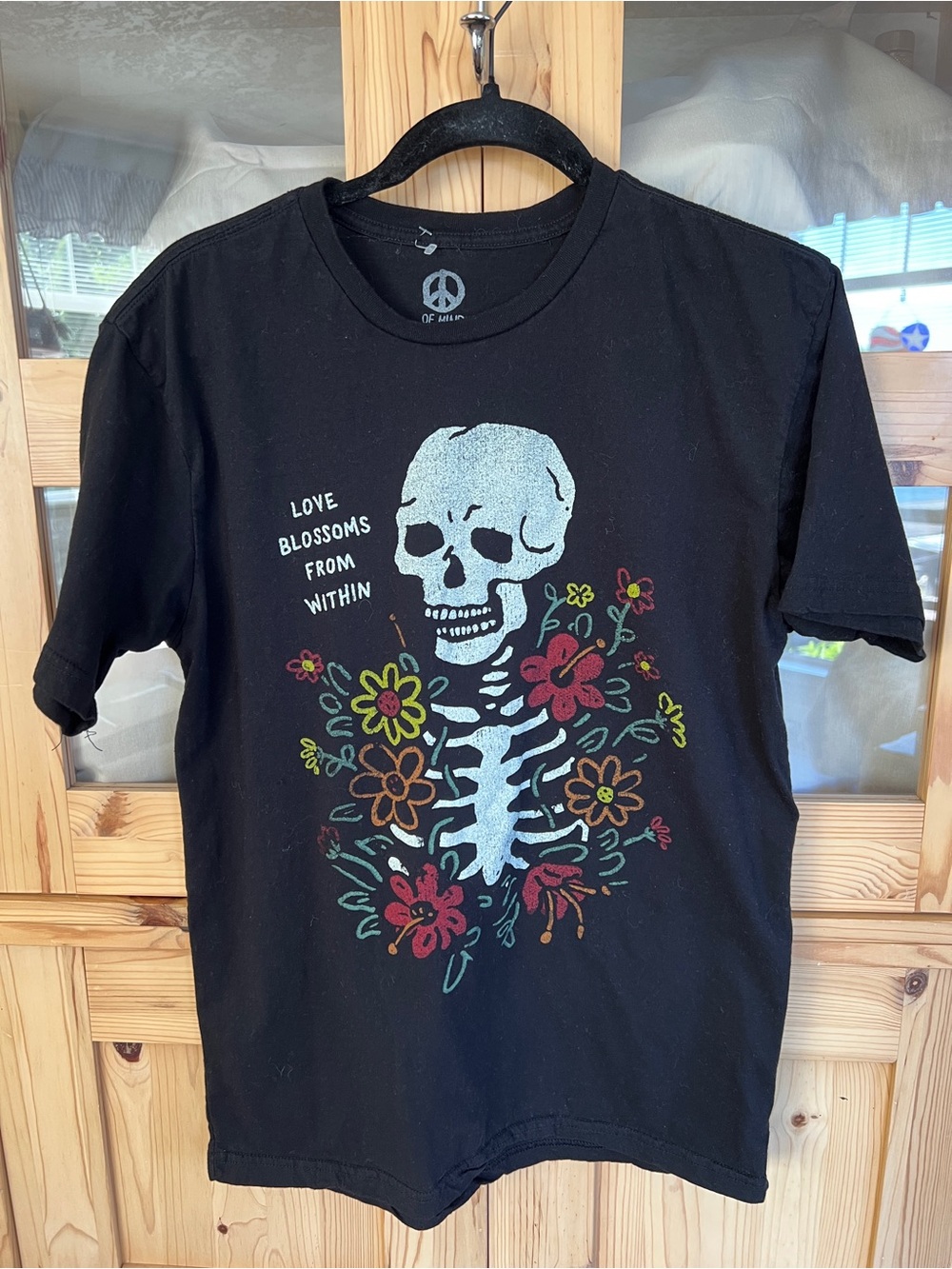 Love Blossoms From Within Black Graphic Tee - Peace Logo